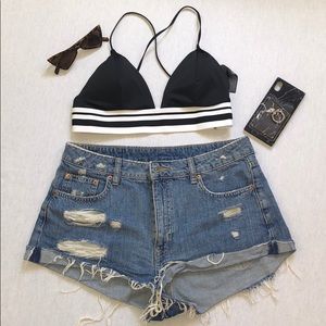 Size 12 distressed denim short. High waisted.